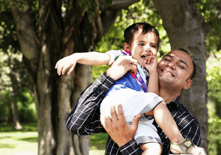 Man holding young child